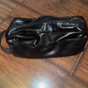 Toiletry bag; leather